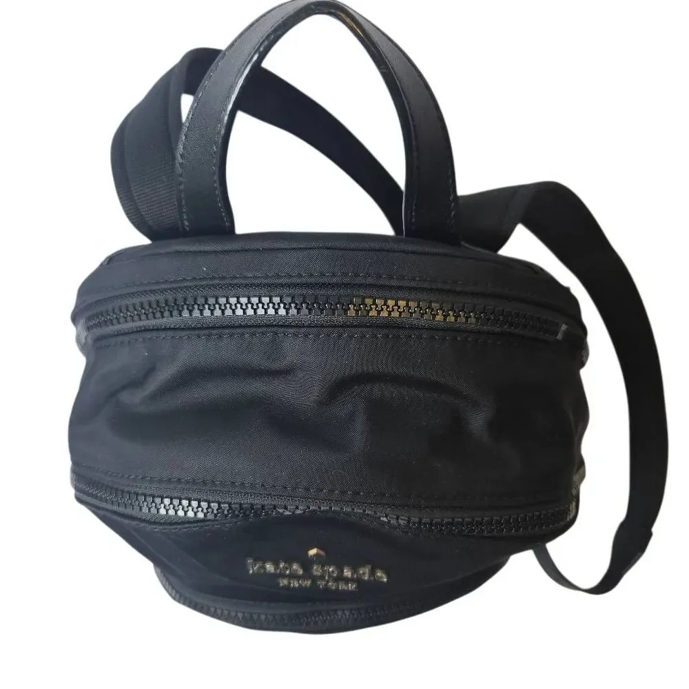 Kate Spade Karissa black nylon backpack, minimalist design.